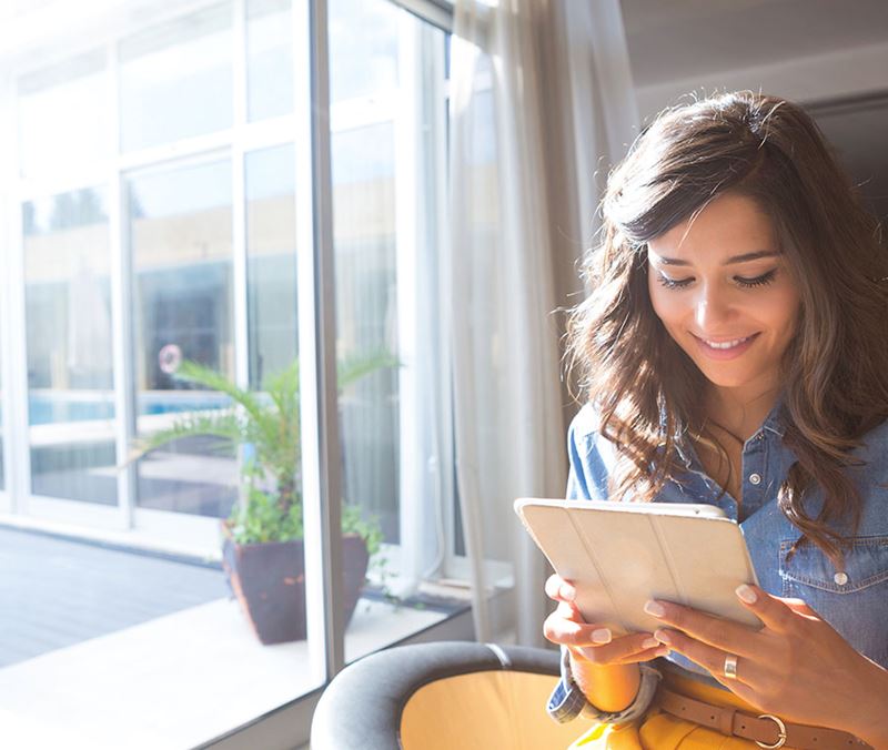 Woman looking at tablet