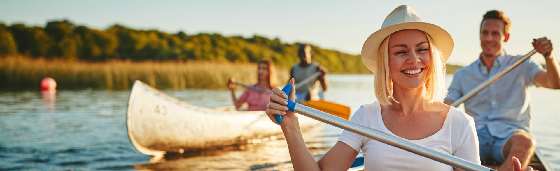 A woman canoeing with friends