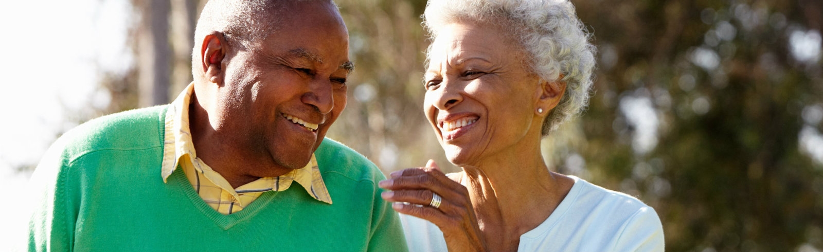 An old couple smiling