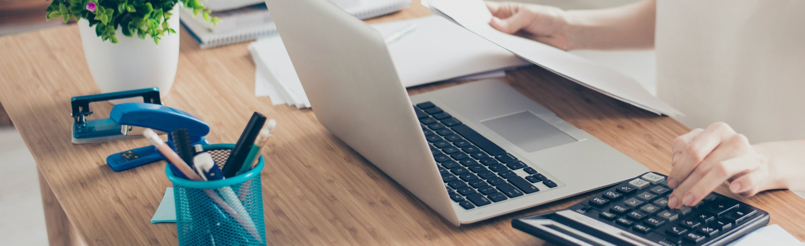 A woman working on a laptop