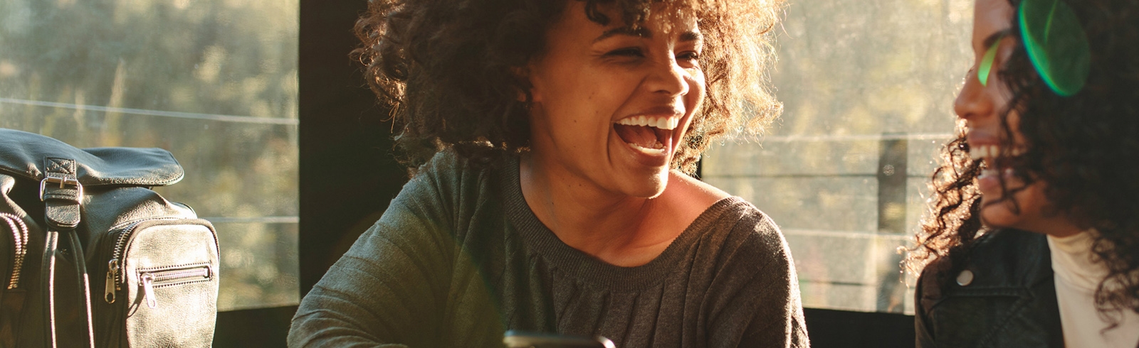 Woman laughing with friends