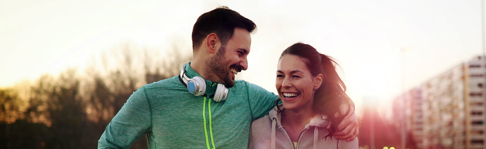 Couple laughing in a park